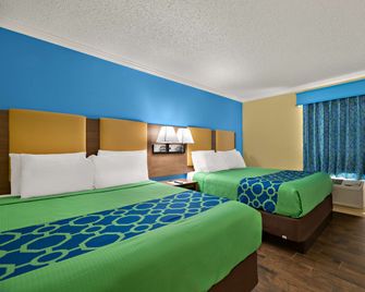 SureStay by Best Western Clermont Theme Park West - Clermont - Ložnice