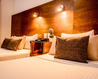 أوتل ديل كارمن إن إل سنترو دي توكستلا جوتيريث - توكستلا جوتيريز - غرفة نوم