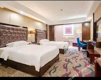 Phoenix Regalia Hotel (Xichang Qionghai Wetland Park) - Liangshan - Schlafzimmer