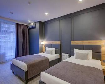 Aurum Hotel - Bişkek - Yatak Odası