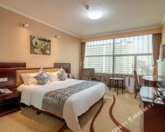 Yuanfei Hotel - Weifang - Schlafzimmer