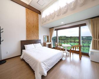 From H T Resort Jeju Seongsan - Thành phố Seogwipo - Phòng ngủ