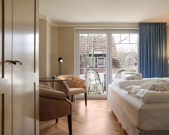 Mimosa House - Sylt - חדר שינה