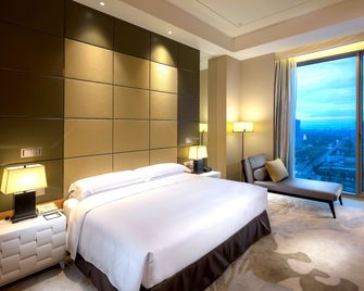 DoubleTree by Hilton Hangzhou East - Hangzhou - Schlafzimmer