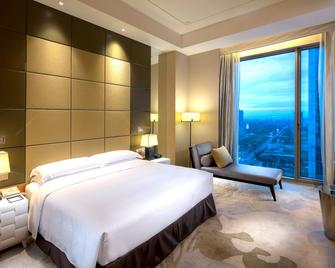 DoubleTree by Hilton Hangzhou East - האנגג'ואו - חדר שינה