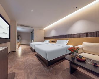 Yi Nian · Fangcun Hotel - Nanchang - Bedroom