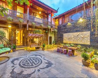 Lijiang Riverside Boutique Inn - Lijiang - Patio