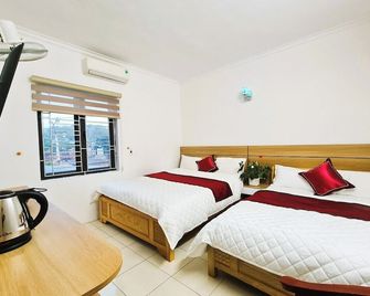 Night Market Heart Hotel MC - Moc Chau - Bedroom