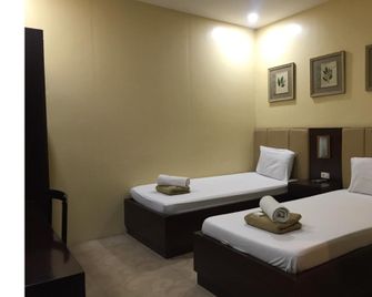 OYO 762 Laurien Hotel - Batangas City - Спальня