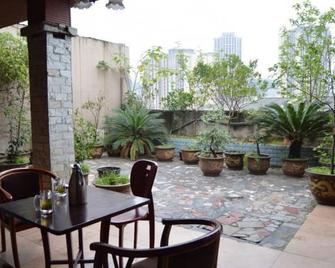 Panda Cub Hotel China West Normal University Branch - Nanchong - Patio