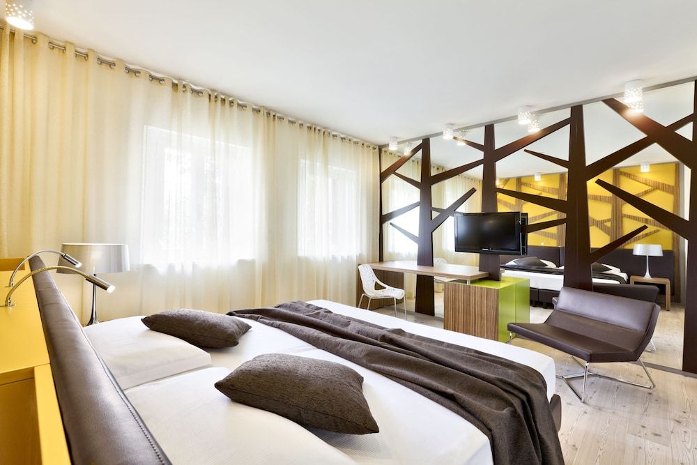 Ai Cadelach Hotel Giulia - Revine Lago - Schlafzimmer