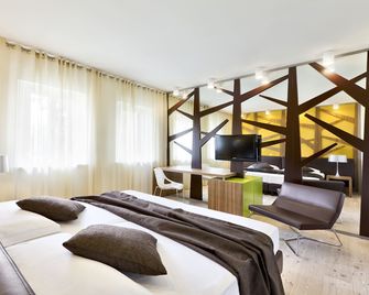 Ai Cadelach Hotel Giulia - Revine Lago - Schlafzimmer