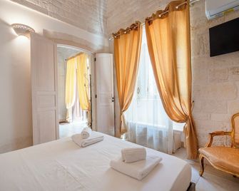 Trulli Contento Rooms E Apartments - Alberobello - Bedroom