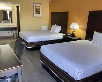 Nendels Inn & Suites Dodge City Airport - Dodge City - Soveværelse