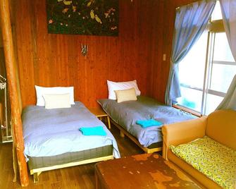 Guest House Miyakojima - Miyakojima - Phòng ngủ