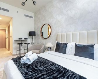 Nasma Luxury Stays - Cozy Urban Studio at Azizi Riviera 43 in Meydan - Dubai - Schlafzimmer