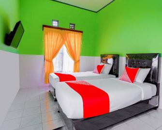OYO 2903 Putri Residence Syariah - Bukittinggi - Bedroom