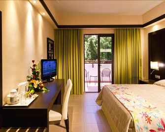 Oceanis Beach & Spa Resort - קוס - חדר שינה