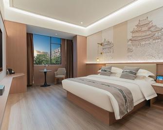 Yichang Xiazhou Yiling Hotel (Jiefang Road Pedestrian Street, Yanjiang Avenue) - 宜昌（ギショウ） - 寝室