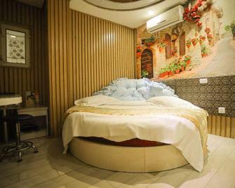Shell Chain Hotel (Mudanjiang North Railway Station Guangsha Branch) - Mudanjiang - Camera da letto