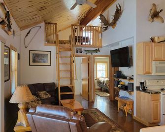 Cabin in the Woods Near Big Chip and Hayward - Winter - Living room