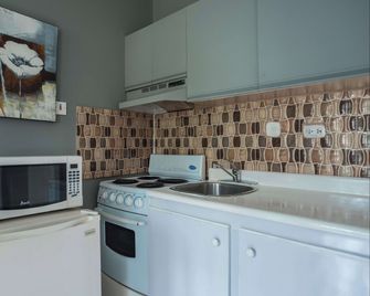 Sandcastles Beach Resort - אוקו ריוס - מטבח