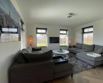 Country House with Terrace near Langweerder Wielen - Sint Nicolaasga - Living room