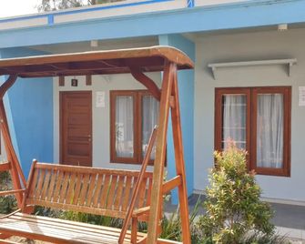 Anugrah Bromo Homestay at Desa Wisata Bromo Mitra RedDoorz - Putus - Patio