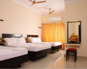 Hotel Bharani - Kanyakumari - Bedroom