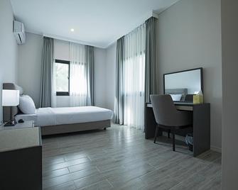 Pacific Palm Resort - Susupe - חדר שינה