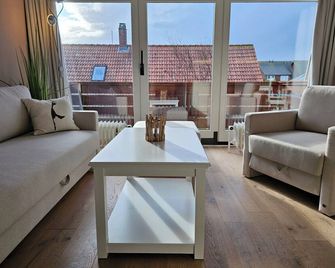 Ferienwohnung Nordstern mit Hästens Bett und Sauna - Wenningstedt-Braderup - Wohnzimmer
