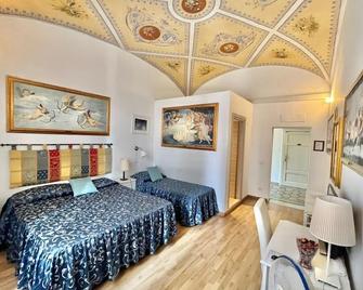 Relais La Corte Dei Cavalieri - Siena - Schlafzimmer