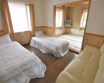 Pension Vingt-Quatre Yeux - Shodoshima - Slaapkamer