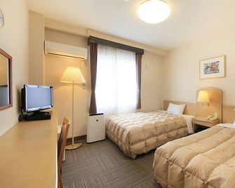 Hotel Sunvalley Izu-Nagaoka Annex - Izunokuni - Schlafzimmer