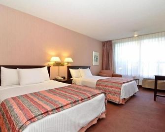 Days Inn & Suites by Wyndham Mountain View - מאונטיין ויו - חדר שינה