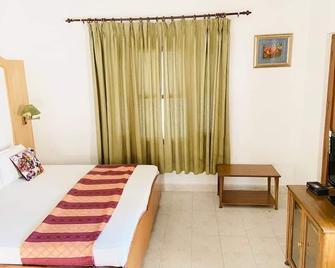 Fresco Hotel And Residences - Pālampur - Schlafzimmer