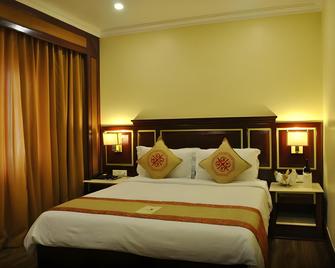 Hotel Dynasty - Guwahati - Bedroom