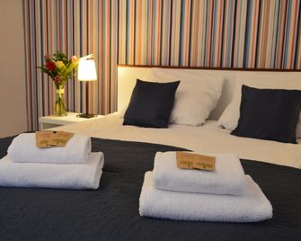 Cracow Central Aparthotel - קראקוב - חדר שינה