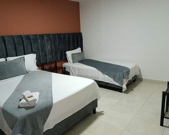 Hotel Empresarial - Pereira - Schlafzimmer