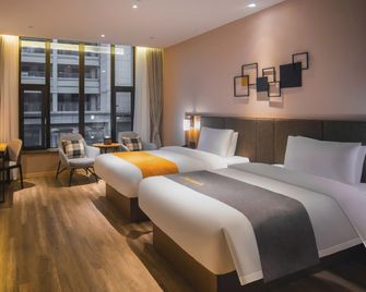 Oriental Xuanwu Hotel - Yancheng - Bedroom