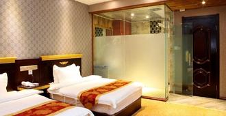 Peacock Princess Hotel - Xishuangbanna - Bedroom