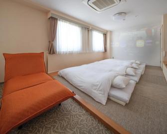 Yokaichi Royal Hotel - Higashiomi - Slaapkamer
