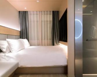 Ji Hotel Shanghai People Square - Shanghai - Camera da letto