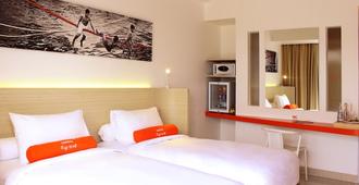 Harris Hotel Samarinda - Samarinda - Schlafzimmer