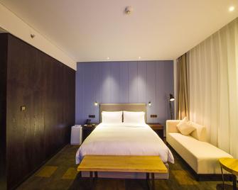 Ease House Hotel - Luoyang - Bedroom