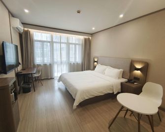 Hanting Hotel Shanghai Daning International Guangyue Road - Shanghai - Schlafzimmer
