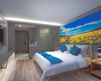 Towo Topping Hotel Hanzhong Shaanxi University Of Technology - Hanzhong - Спальня