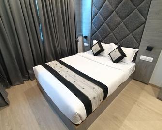 Hotel Beverly Palace Santacruz - Near Bkc - Mumbai Airport T1 - מומבאי - חדר שינה