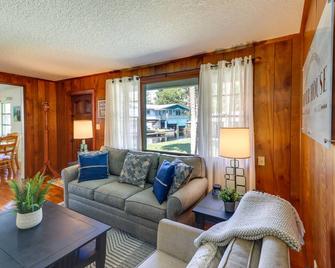 Charming Canalfront Retreat with Double Boat Slip! - Astor - Living room