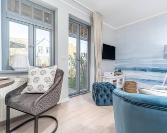 Ferienhaussiedlung Strandperlen Sanddornhof 2d (Typ I) - Wustrow (Darss) - Wohnzimmer